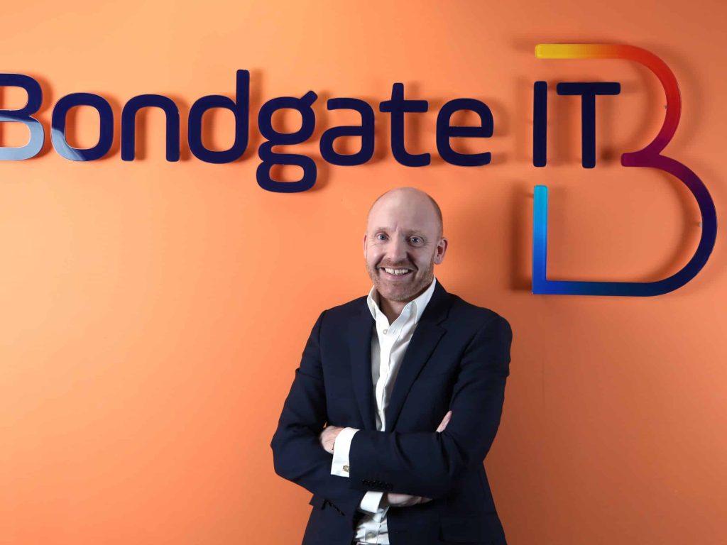 Garry Brown, managing director of Bondgate IT standing in the office